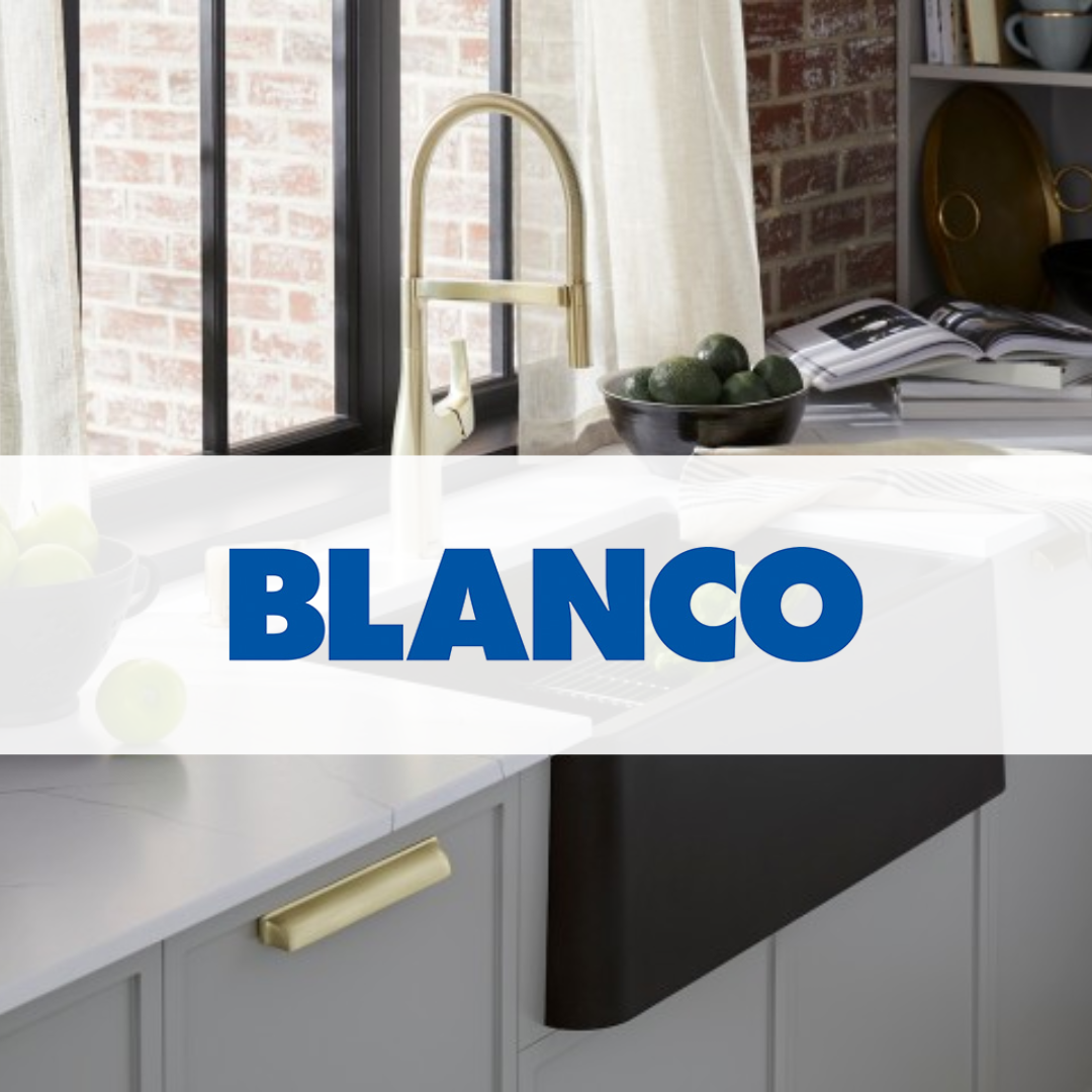 BLANCO kitchen faucet and sink with gold hardware, set against a modern grey countertop and brick window backdrop, featuring natural light and sleek design.